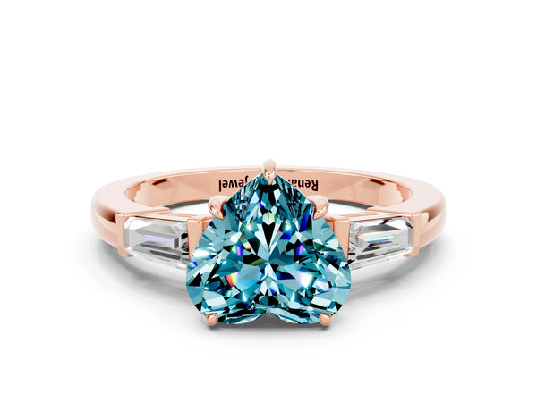 Rose gold Heart Cut Cut Diamond Ring with Tapered Baguette Side Stones in Four-Prong Setting