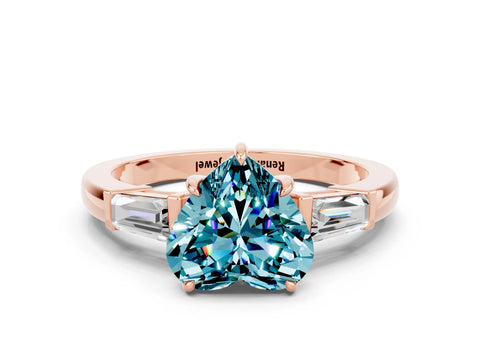 Rose gold Heart Cut Cut Diamond Ring with Tapered Baguette Side Stones in Four-Prong Setting