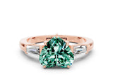 Rose gold Heart Cut Cut Diamond Ring with Tapered Baguette Side Stones in Four-Prong Setting