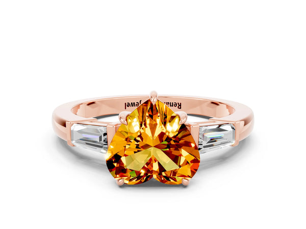 Rose gold Heart Cut Citrine Three-Stone Ring with Tapered Baguette Side Stones and Prong Setting