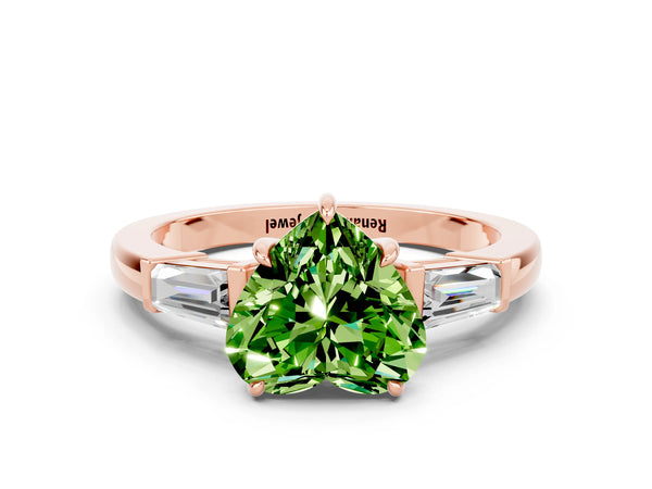 Rose gold Heart Cut Cut Diamond Ring with Tapered Baguette Side Stones in Four-Prong Setting