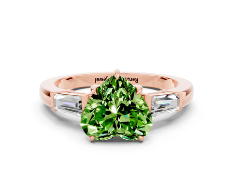 Rose gold Heart Cut Cut Diamond Ring with Tapered Baguette Side Stones in Four-Prong Setting
