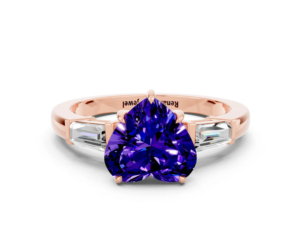 Rose gold Heart Cut Tanzanite Three-Stone Ring with Tapered Baguette Side Stones and Prong Setting