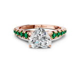 Rose gold Heart Cut Diamond Cathedral Solitaire Ring with Round with Emerald side stone Pavé Band