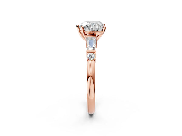 Rose gold Heart Cut Diamond Ring with Baguette Side Stones, Channel Set Band, and Four-Prong Setting