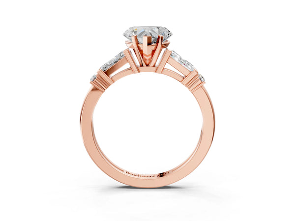 Rose gold Heart Cut Diamond Ring with Baguette Side Stones, Channel Set Band, and Four-Prong Setting