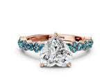 Rose gold Heart Cut Diamond Side Stone Solitaire Ring with Round with Blue Topaz side stone and Four-Prong Setting