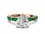 Rose gold Heart Cut Diamond Side Stone Solitaire Ring with Round with Emerald side stone and Four-Prong Setting