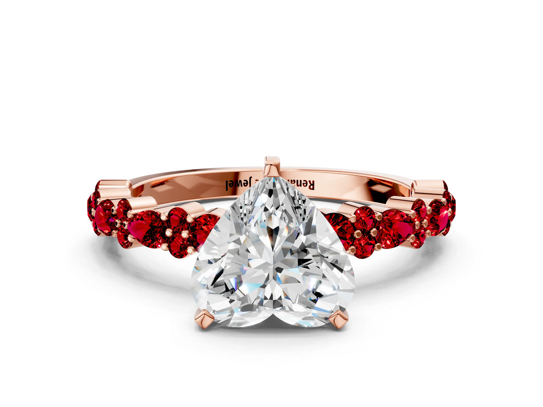 Rose gold Heart Cut Diamond Side Stone Solitaire Ring with Round with Ruby side stone and Four-Prong Setting