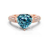 Rose gold Heart Cut Diamond Solitaire Engagement Ring with Pavé Band and Four-Prong Setting