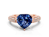 Rose gold Heart Cut Diamond Solitaire Engagement Ring with Pavé Band and Four-Prong Setting