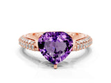Rose gold Heart Cut Diamond Solitaire Engagement Ring with Pavé Band and Four-Prong Setting