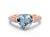 Rose gold Heart Cut Diamond Solitaire Engagement Ring with Pavé Band and Four-Prong Setting