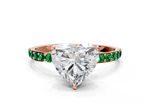 Rose gold Heart Cut Diamond Solitaire Engagement Ring with Round with Emerald side stone Pavé Band and Prong Setting
