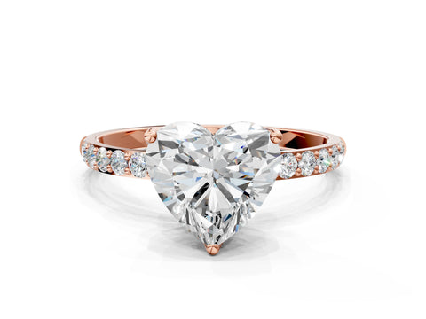 Rose gold Heart Cut Diamond Solitaire Engagement Ring with Round with Moissanite side stone Pavé Band and Prong Setting