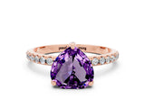 Rose gold Heart Cut Diamond Solitaire Ring with Four-Prong Setting and Pavé Band