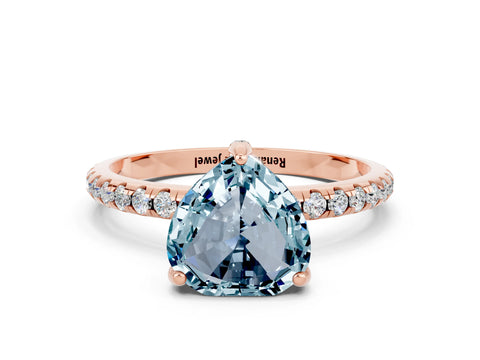 Rose gold Heart Cut Diamond Solitaire Ring with Four-Prong Setting and Pavé Band