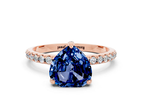 Rose gold Heart Cut Diamond Solitaire Ring with Four-Prong Setting and Pavé Band