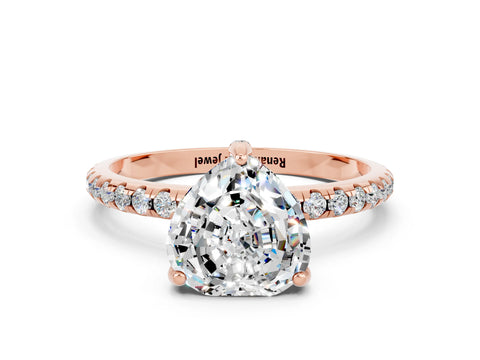 Rose gold Heart Cut Diamond Solitaire Ring with Four-Prong Setting and Pavé Band