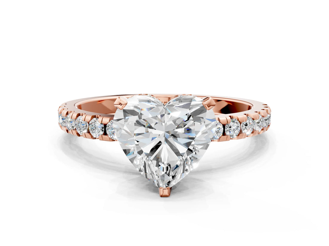Rose gold Heart Cut Diamond Solitaire Ring with Pavé Band and Four-Prong Setting