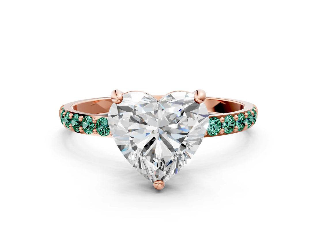 Rose gold Heart Cut Diamond Solitaire Ring with Round with Green Sapphire side stone Pavé Band and Prong Setting