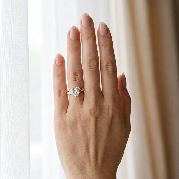 Rose gold Heart Cut Diamond Solitaire Ring with Twisted Band and Pavé Accents