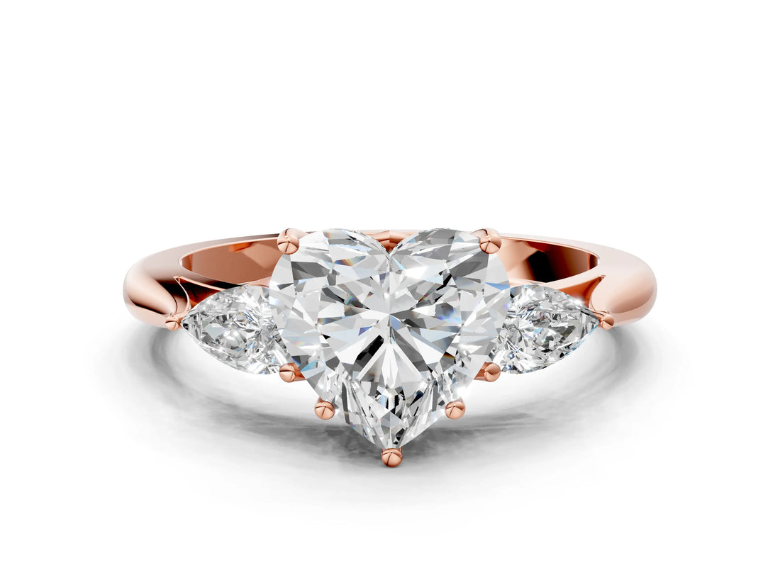 Rose gold Heart Cut Diamond Three-Stone Ring with Pear Side Stones and Four-Prong Setting_93