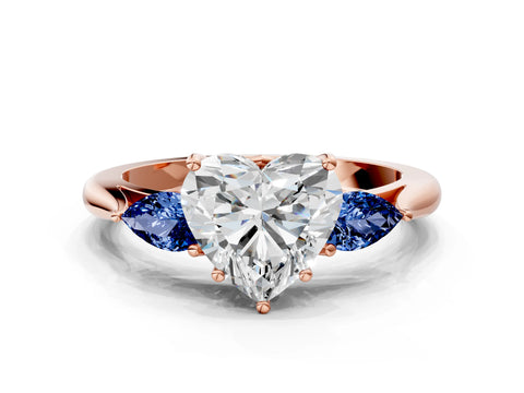 Rose gold Heart Cut Diamond Three-Stone Ring with Pear with Blue Sapphire side stone Side Stones and Prong Setting