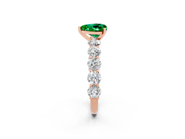 Rose gold Heart Cut Emerald Prong Setting with Side Stones on a Pave Band