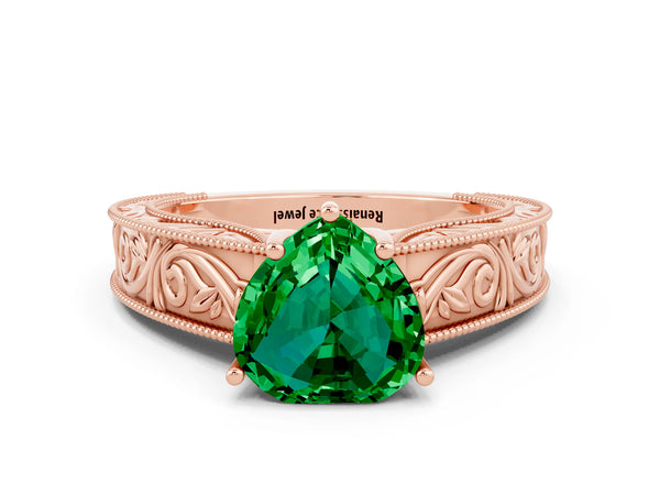 Rose gold Heart Cut Emerald Solitaire Ring with Engraved Band and Four-Prong Setting