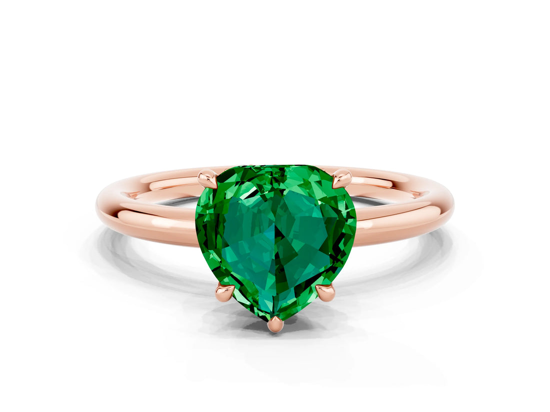 Rose gold Heart Cut Emerald Solitaire Ring with Thin Band and Four-Prong Setting