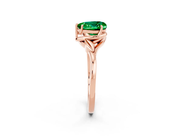 Rose gold Heart Cut Emerald Solitaire Ring with Twist Band and Four-Prong Setting