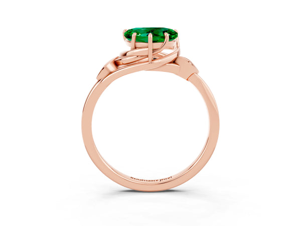 Rose gold Heart Cut Emerald Solitaire Ring with Twist Band and Four-Prong Setting