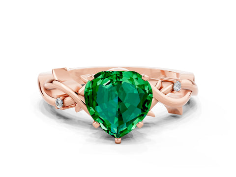 Rose gold Heart Cut Emerald Solitaire Ring with Twisted Band and Prong Setting