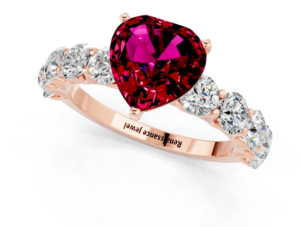 Rose gold Heart Cut Garnet Prong Setting with Side Stones on a Pave Band