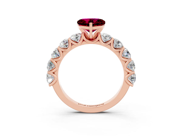 Rose gold Heart Cut Garnet Prong Setting with Side Stones on a Pave Band