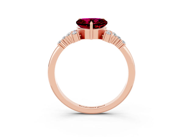 Rose gold Heart Cut Garnet Ring with Side Stones and Four-Prong Setting