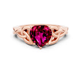 Rose gold Heart Cut Garnet Solitaire Engagement Ring with Celtic Knot Band and Four-Prong Setting