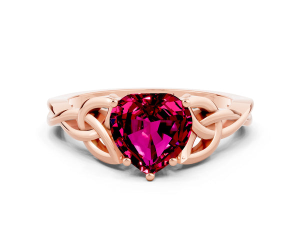 Rose gold Heart Cut Garnet Solitaire Engagement Ring with Celtic Knot Band and Four-Prong Setting