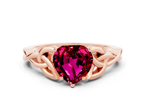 Rose gold Heart Cut Garnet Solitaire Engagement Ring with Celtic Knot Band and Four-Prong Setting