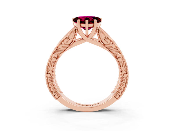 Rose gold Heart Cut Garnet Solitaire Ring with Engraved Band and Four-Prong Setting