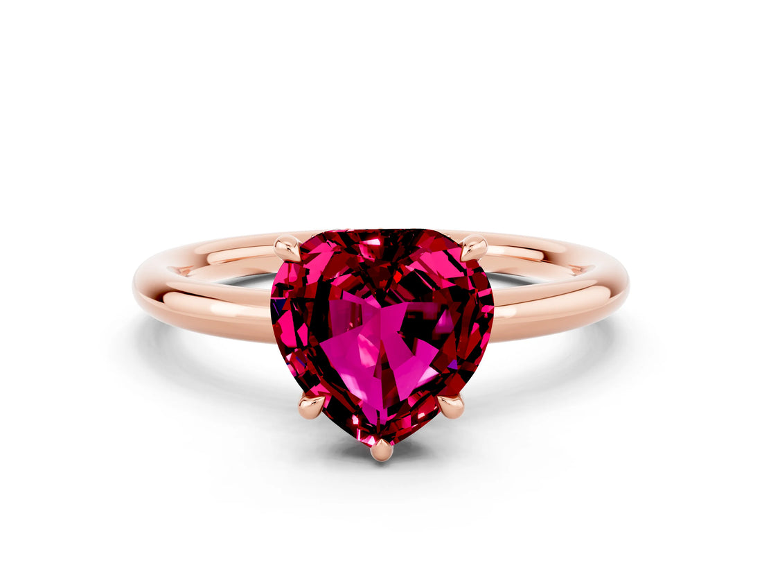 Rose gold Heart Cut Garnet Solitaire Ring with Thin Band and Four-Prong Setting