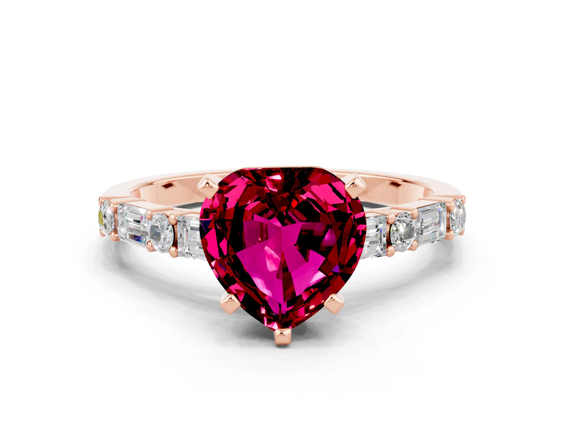 Rose gold Heart Cut Garnet Solitaire with Side Baguettes and Channel Set Band