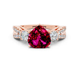 Rose gold Heart Cut Garnet Three-Stone Ring with Pavé Split Shank and Four-Prong Setting
