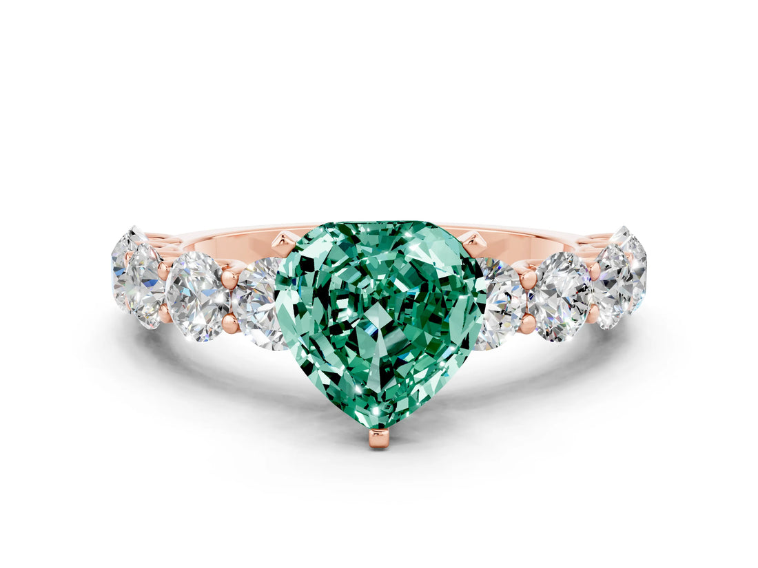 Rose gold Heart Cut Green Sapphire Prong Setting with Side Stones on a Pave Band