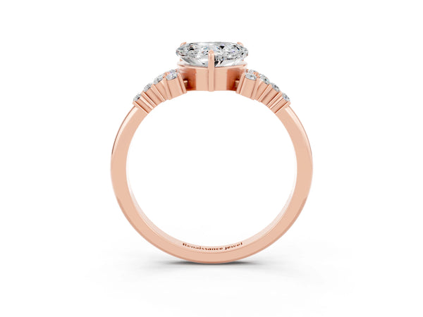 Rose gold Heart Cut Moissanite Ring with Side Stones and Four-Prong Setting