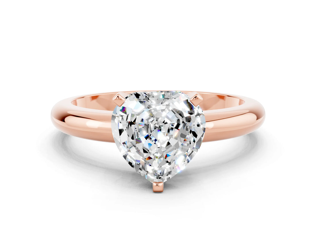 Rose gold Heart Cut Moissanite Solitaire Engagement Ring with Round Band and Four-Prong Setting