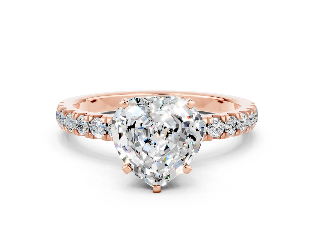 Rose gold Heart Cut Moissanite Solitaire Ring with Pavé Accents and Four-Prong Setting