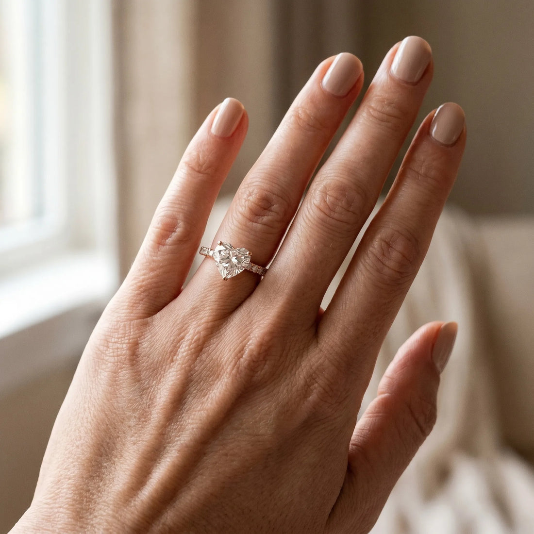 Rose gold Heart Cut Moissanite Solitaire Ring with Round  Pavé Band and Four-Prong Setting