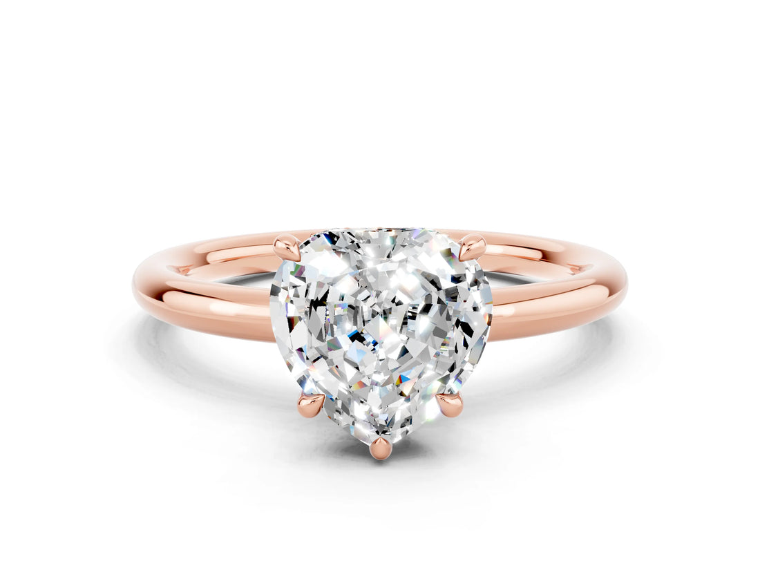 Rose gold Heart Cut Moissanite Solitaire Ring with Thin Band and Four-Prong Setting